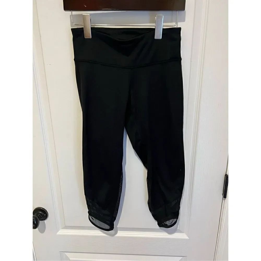 Champion black Capri leggings with sheer back of leg Design size small